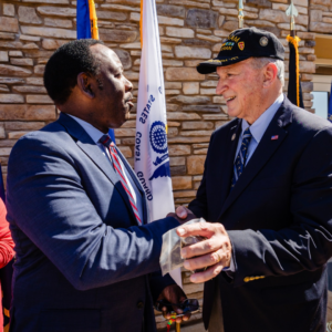 Mayor Demings with a local Veteran at a ceremony.