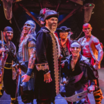 actors in the pirate's dinner adventure in halloween costume attire