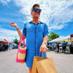 woman shopping at homegrown in horizon west; a local farmer and artisan market in horizon west 