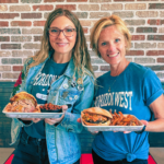 two guests enjoying their meals at ellie lou's bbq and brews 